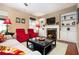 A comfortable living room with a fireplace, built-in shelves, and plush seating at 4306 Laurel Creek Se Ct, Smyrna, GA 30080