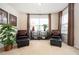 Cozy sitting area featuring natural light and comfortable seating at 4306 Laurel Creek Se Ct, Smyrna, GA 30080