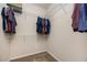 Bright walk-in closet featuring wire shelving and carpet flooring at 4306 Laurel Creek Se Ct, Smyrna, GA 30080