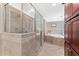Beautiful bathroom with a large glass enclosed shower and a separate soaking tub at 4649 Equestrian Way, Atlanta, GA 30338