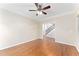 Inviting living room with hardwood floors, staircase access, and neutral paint at 4649 Equestrian Way, Atlanta, GA 30338