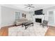 Comfortable living room with fireplace and large window for natural light at 4649 Equestrian Way, Atlanta, GA 30338