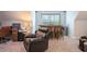 Bonus room features a bar area with seating and an adjacent seating area for relaxing at 62 Presley Farm Pkwy, Rockmart, GA 30153
