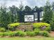 Charming Presley Farms community entrance sign surrounded by lush landscaping, creating a welcoming and attractive first impression at 62 Presley Farm Pkwy, Rockmart, GA 30153