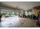 Spacious garage with room for vehicles, lawn equipment, and storage; driveway and landscape visible at 62 Presley Farm Pkwy, Rockmart, GA 30153