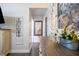 Bright hallway with decor, lighting and a view of other rooms in the house at 62 Presley Farm Pkwy, Rockmart, GA 30153