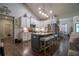 Spacious kitchen featuring a large island, white cabinetry, and stainless steel appliances at 62 Presley Farm Pkwy, Rockmart, GA 30153