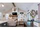 Comfortable living room with vaulted ceilings, stone fireplace, and ample natural light at 62 Presley Farm Pkwy, Rockmart, GA 30153