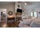 Cozy living room featuring a stone fireplace, built-in shelves, and comfortable seating at 62 Presley Farm Pkwy, Rockmart, GA 30153