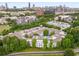 An aerial view displaying the community, highlighting architectural features and showcasing landscaping, parking, and city views at 821 Ralph Mcgill Ne Blvd # 2113, Atlanta, GA 30306