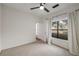 Bright bedroom with a ceiling fan and a large window with curtains at 821 Ralph Mcgill Ne Blvd # 2113, Atlanta, GA 30306