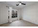 Bright bedroom with a ceiling fan and a large window with curtains at 821 Ralph Mcgill Ne Blvd # 2113, Atlanta, GA 30306