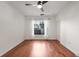 Bedroom featuring hardwood floors, white walls, a ceiling fan, and a window at 821 Ralph Mcgill Ne Blvd # 2113, Atlanta, GA 30306