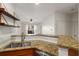 Kitchen with stainless steel appliances, granite countertops, and a view into the living area at 821 Ralph Mcgill Ne Blvd # 2113, Atlanta, GA 30306