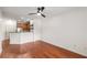 Open-concept living room featuring sleek hardwood floors and a modern ceiling fan at 821 Ralph Mcgill Ne Blvd # 2113, Atlanta, GA 30306