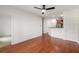 Open-concept living room featuring sleek hardwood floors and a modern ceiling fan at 821 Ralph Mcgill Ne Blvd # 2113, Atlanta, GA 30306