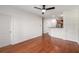Open-concept living room featuring sleek hardwood floors and a modern ceiling fan at 821 Ralph Mcgill Ne Blvd # 2113, Atlanta, GA 30306