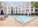 Community swimming pool with a stylish water feature and comfortable seating areas for residents at 821 Ralph Mcgill Ne Blvd # 2113, Atlanta, GA 30306