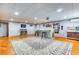 Spacious basement with a custom bar, pool table and arcade games for entertaining at 2334 Fisher Dr, Loganville, GA 30052