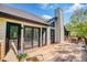 An expansive deck with lounge chairs offers a relaxing outdoor space with a wooden table and dining chairs at 2334 Fisher Dr, Loganville, GA 30052