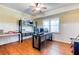 Bright home office with ceiling fan and laminate flooring at 2334 Fisher Dr, Loganville, GA 30052