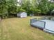 Extensive backyard offers a shed, a gray deck, a fenced perimeter, and a well-maintained lawn at 3089 Ranlo Dr, Atlanta, GA 30340