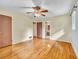 Bedroom featuring hardwood floors, ceiling fan, and access to adjoining bathroom at 3089 Ranlo Dr, Atlanta, GA 30340