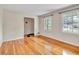 Living room boasts gleaming hardwood floors and natural light from windows at 3089 Ranlo Dr, Atlanta, GA 30340