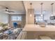 Open concept living room flowing into a kitchen with an adjacent bar at 493 Woods Nw Dr, Atlanta, GA 30318