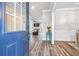 Inviting entryway with beautiful flooring and views of the living spaces at 5652 Burruss Rd, Cumming, GA 30028