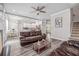 Open floor plan view from living room to the gourmet kitchen and eating area at 5652 Burruss Rd, Cumming, GA 30028