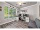 Bright office with a large window, ample desk space, and comfortable seating at 5652 Burruss Rd, Cumming, GA 30028