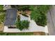 A beautifully renovated single story home showing roof, driveway, and landscaping from above at 788 Fayetteville Se Rd, Atlanta, GA 30316