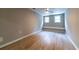 Bedroom showcasing two windows with bench seating and plank flooring at 788 Fayetteville Se Rd, Atlanta, GA 30316