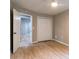 Well-lit bedroom with wood-look floors and double-door closet at 788 Fayetteville Se Rd, Atlanta, GA 30316