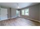 Bedroom with wood-look floors and ensuite bathroom at 788 Fayetteville Se Rd, Atlanta, GA 30316