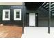 Exterior view of house with painted brick, siding, exterior stairs, and door at 788 Fayetteville Se Rd, Atlanta, GA 30316