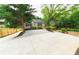 Single-story home showcasing its driveway, welcoming entrance, tasteful landscaping, and well-kept lawn at 788 Fayetteville Se Rd, Atlanta, GA 30316