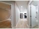 Hallway view of a well-lit house interior with kitchen and bathroom at 788 Fayetteville Se Rd, Atlanta, GA 30316