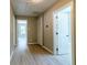 Hallway with wood flooring and access to other rooms at 788 Fayetteville Se Rd, Atlanta, GA 30316
