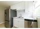Updated kitchen with stainless steel appliances, white cabinets, and modern countertops at 788 Fayetteville Se Rd, Atlanta, GA 30316