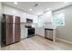 Bright, modern kitchen with stainless steel appliances and white cabinetry at 788 Fayetteville Se Rd, Atlanta, GA 30316