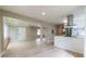 Open-concept living room with modern finishes flowing into a bright, updated kitchen at 788 Fayetteville Se Rd, Atlanta, GA 30316