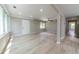 Large living room with updated floors, natural light, and access to the backyard at 788 Fayetteville Se Rd, Atlanta, GA 30316