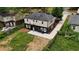 Aerial view of the property showcasing two-story home, outdoor staircase, fencing and surrounding yard at 788 Fayetteville Se Rd, Atlanta, GA 30316