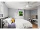 The bedroom includes a desk for studying and hardwood floors at 2647 Forrest Nw Ave, Atlanta, GA 30318
