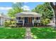 Charming home featuring a welcoming front porch, complemented by a well-manicured lawn and inviting curb appeal at 2647 Forrest Nw Ave, Atlanta, GA 30318