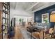 Bright, open-concept living space with hardwood floors, high ceilings, and a seamless flow to the kitchen at 2647 Forrest Nw Ave, Atlanta, GA 30318