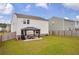 Spacious backyard with a pergola, offering an inviting outdoor living space at 3828 Ramsay Pass, Loganville, GA 30052