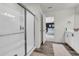 This stylish bathroom features a glass shower and modern finishes at 3828 Ramsay Pass, Loganville, GA 30052